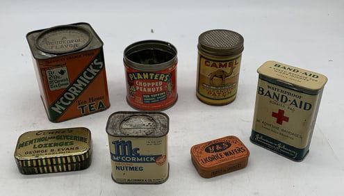 7 advertising tins
