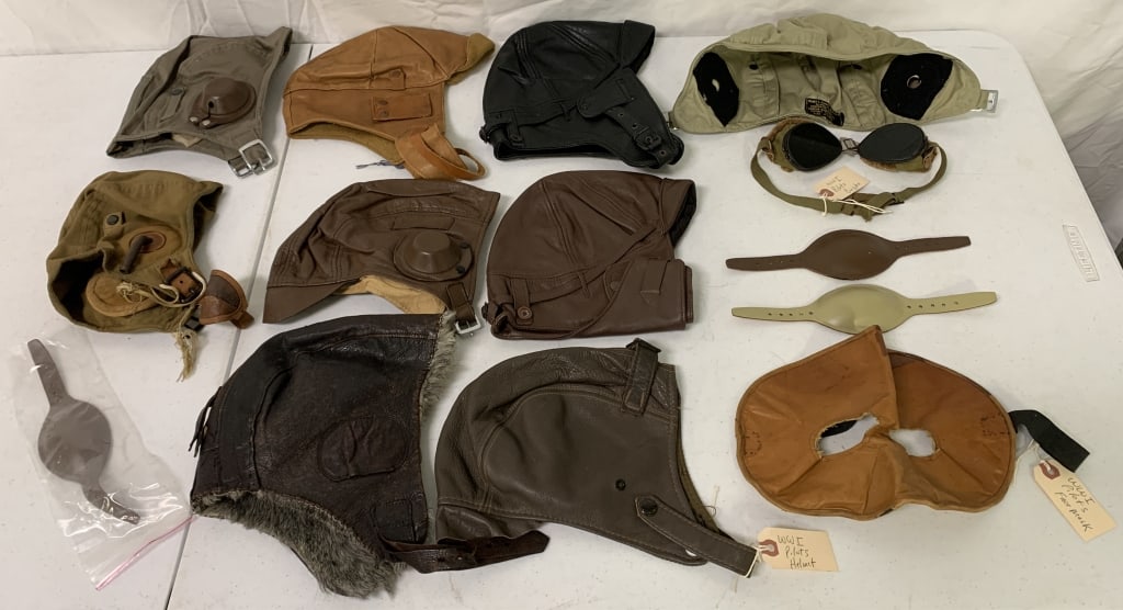 14 Pilot Hats,Chin Straps,Goggles: Cloth,leather,goggles marked WW1,mask marked WW1,all have been worn, Reproduction ?
