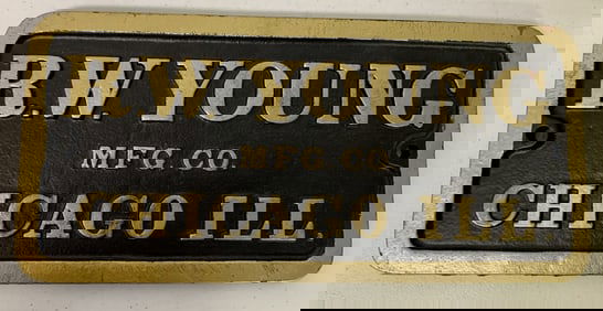 R. W. Young Mfg. Co. cast iron sign