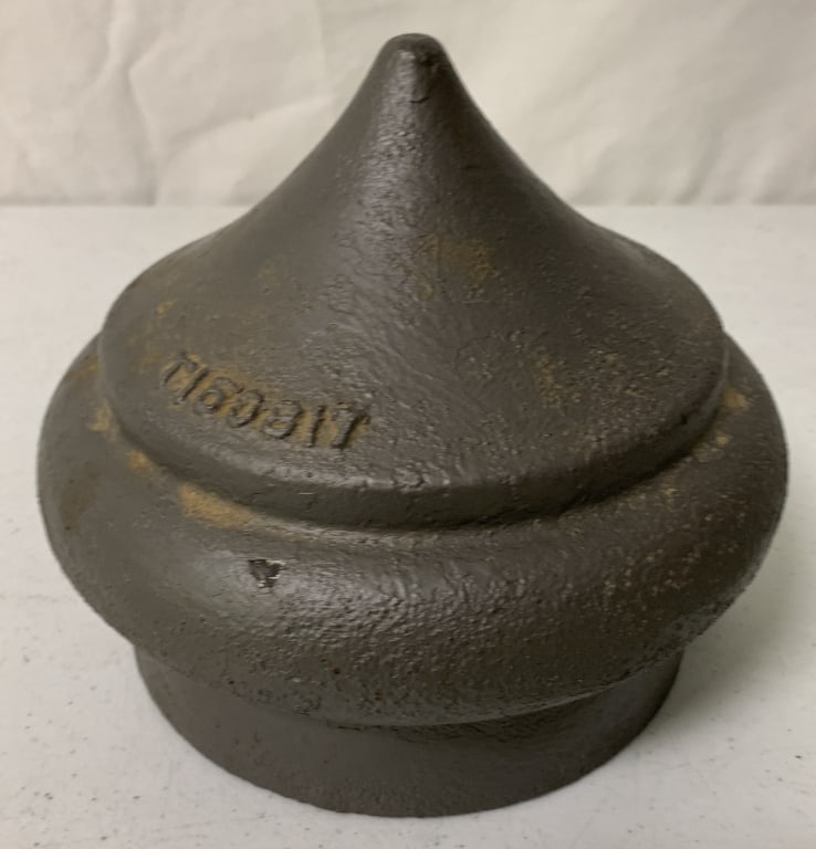 cast iron post top: has been repainted shows wear with pitting under paint
