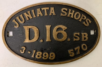 Juniata shops brass sign
