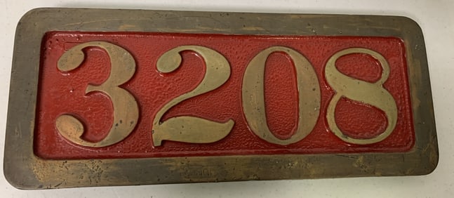brass? 3208 number plate