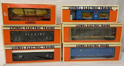 6 Lionel train cars with boxes