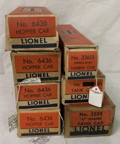 7 Lionel Hopper cars, tank cars + lumber car