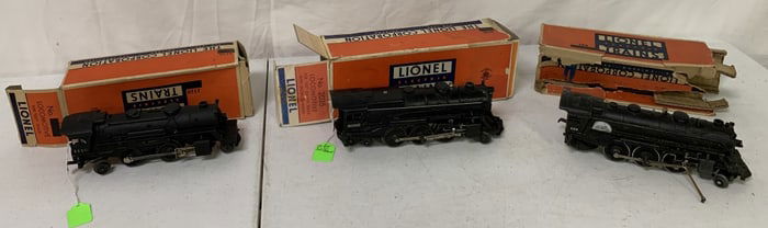 Lionel locomotives 2035, 224 and 1110 in boxes