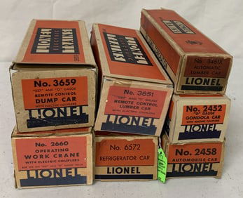 7 different Lionel cars in boxes