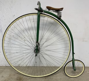 refinished penny farthing high wheel bicycle