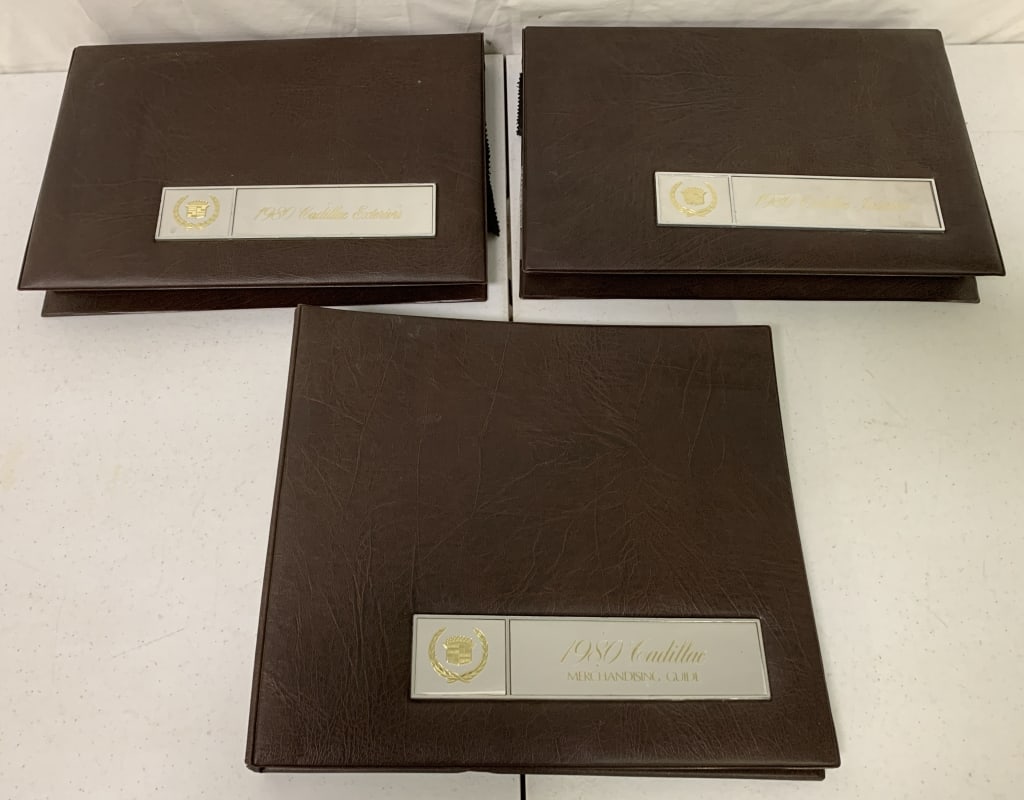3 1980 Cadillac Interior,Merchandising Binders: 1 binder says exterior but has interior swatches,others correct,show some wear