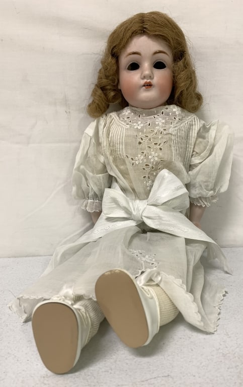 Vintage Doll: bisque head, ceramic arms, some wear and age, numbers on the back of her head, missing her eyes but something rattling inside her head, 20" long