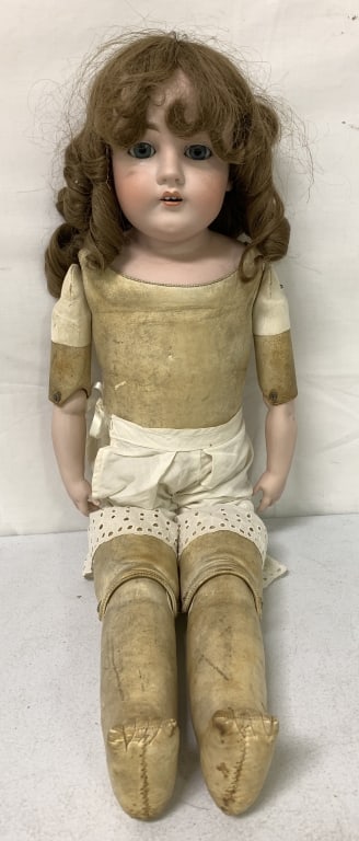 Vintage Doll: bisque head, ceramic arms, rest of doll seems like it could possibly be leather, lots of age, wear, and cracking on the doll's body, eyes open and close, no names or markings, 28" tall