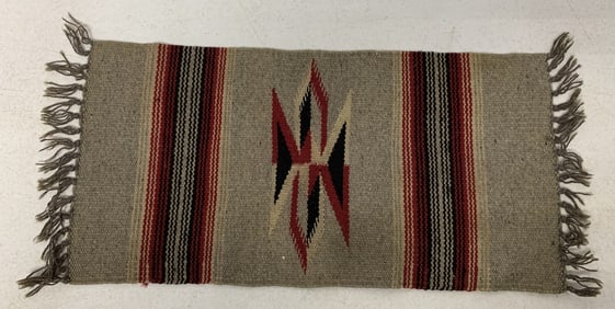 small hand woven rug or placemat