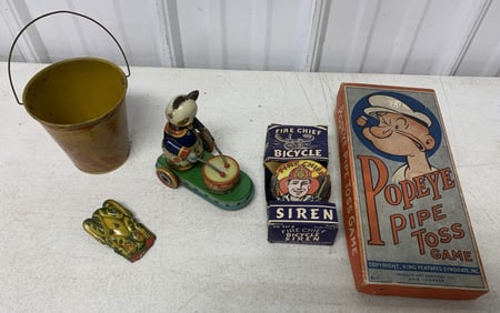 lot of vintage toys; Popeye Pipe Toss, Bicycle