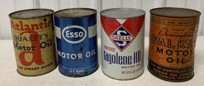 4 full Motor Oil quart cans