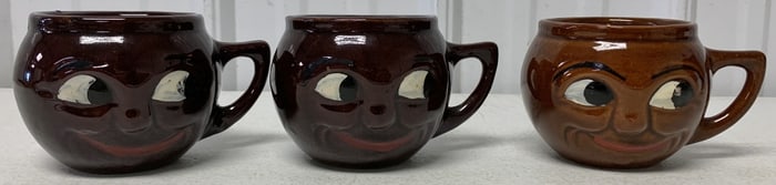 3 Monmouth Pottery black smiley face mugs