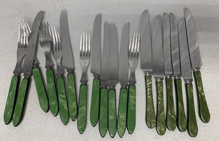 18 green handled knives and forks