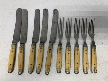 10 bone handled knives and forks