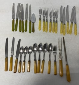 25+ pieces of bakelite handle flatware