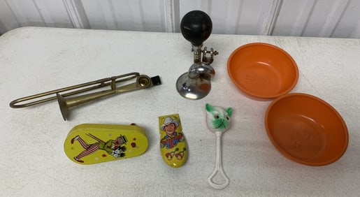 bike horn, trombone kazoo, Skippy bowls, clicker,