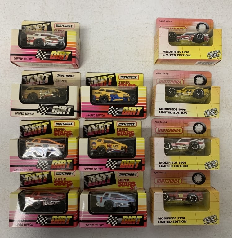 11 Matchbox Dirt And Modified race cars in boxes: boxes have wear, some have fading