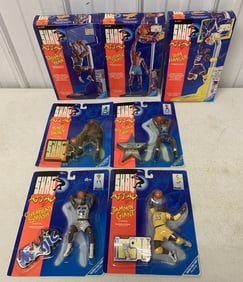 7 different Shaq Attaq figures