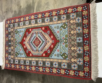 55 1/2"  x 32 1/2" oriental rug