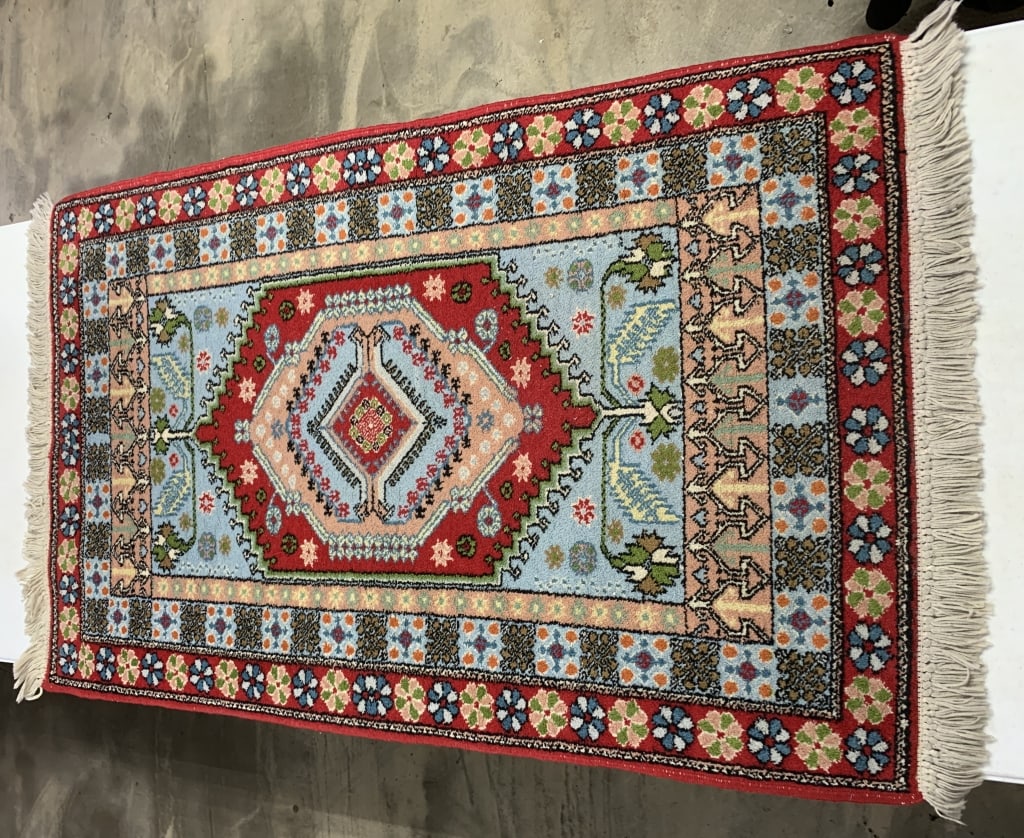 55 1/2" x 32 1/2" oriental rug: has wear; see photos