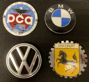 4 automobile badges