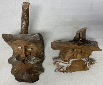 2 wood carved tree spirits