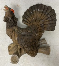 hand carved bird figurine