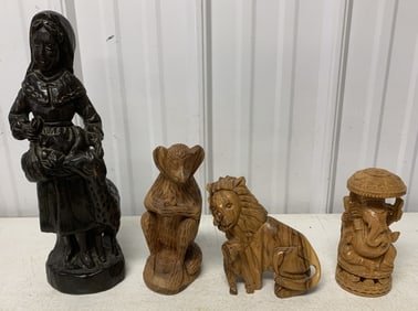 4 wood carvings from various countries