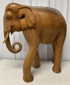large solid wood carved elephant