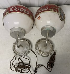 pair of Coors wall sconces