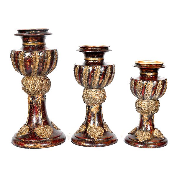 Brioche Candleholder Set of 3: This set of three candleholders brings a big look at a great AFD Home value. Rose blossom and carved-leaf ornamentations are presented in relief on each piece with antique multi-tone finish. This trea