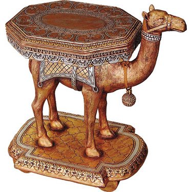 Camel Side Table: This Bedouin dromedary is replete with halter & blanket and even wears the decorative bell as tradition still honors today. Fit for the oasis - this accent table conveys Moroccan and Arabian richness.