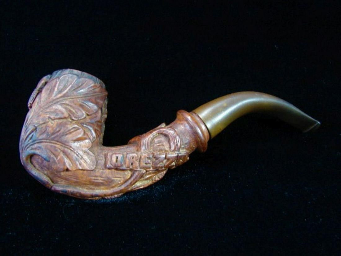Orezza Pipe Antique Elegantly Carved with Oak Leaves: This pipe was made in France when briar was just starting to be utilized in pipes. Orezza was the original St. Claude.