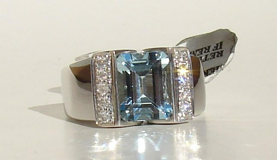 Ladies 14K White Gold Large Blue Topaz and Diamond Ring: Ladies large 10 x 7 mm natural topaz and diamond ring, 10 diamonds = 1/4 TW, size 8.5, weighs 12.2 grams, marks inside, includes box