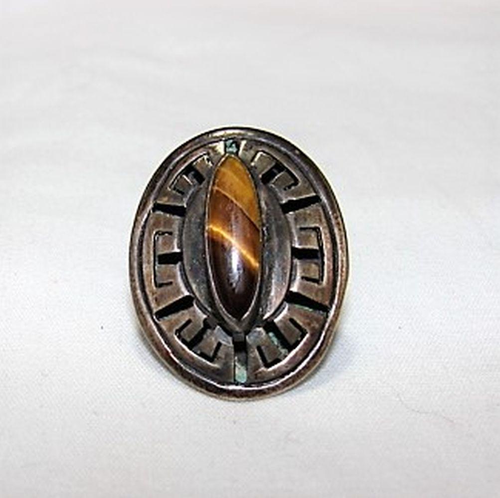 Vintage Sterling Silver and Tigers Eye Adjustable Ring: Marked made in Mexico, 925, Beto and some other illegible markings, weighs 6.6 grams
