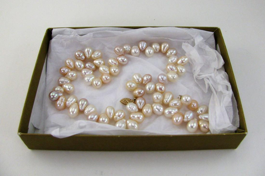 Ladies Baroque Natural Pearl Necklace, 18" Marked 585: Hallmark on clasp, III with diamonds inside of the "Is", the box is not the orignial.