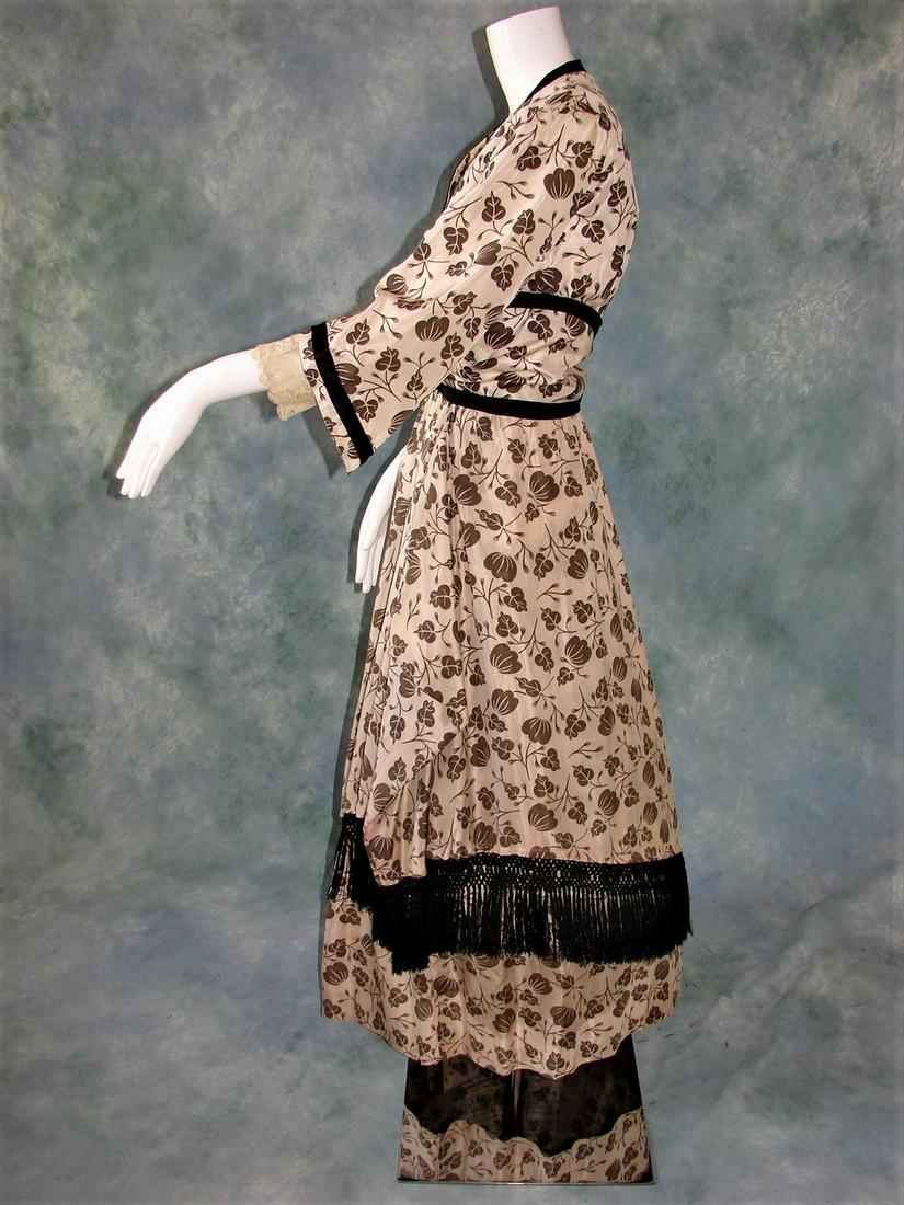 Edwardian Belding's Patterned Silk 2 Piece Bustle Dress: The top has a lace modesty panel with black jet beads, the wrists are lined in the same lace and backed with a mint silk, there is a self belt that runs around the waist and closes with a hook and eye