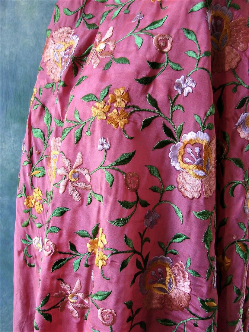 Edwardian Chinese Import Silk Piano Scarf with Fringe: Pink silk piano scarf embroidered all over with floral motif, measures 48" x 48" and has hand knotted fringe that is 18" long.