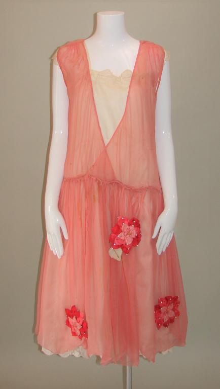 1923 Robe de Style Wedding Ensemble: 3 Piece robe de style wedding set, pink chiffon gown with large silk flowers and prong set rhinestones, pin tucks at the shoulders, applied lace at the shoulders and in the back, scalloped hem 45" L x