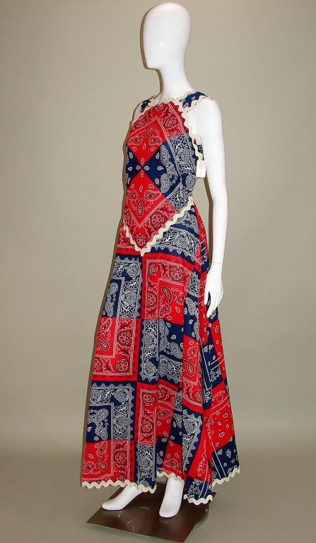 1970s Handkerchief Print Maxi Dress: Wide hem maxi dress, Howard Wolf label, deadstock, red, white, and blue with oversized white rick rack, marked size 8, zips up the back and has a hook and eye56"L X 34"B & H X 28"W X 15" shoulder to s