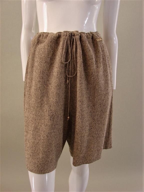 St. John Knit Shorts & Top: Soft beige and white knitted vest, St. John by Marie Gray 24" L x 18" shoulder to shoulderShorts are multiple browns and creme knit, St. John Sport by Marie Gray, elastic waist with a drawstring 21" L