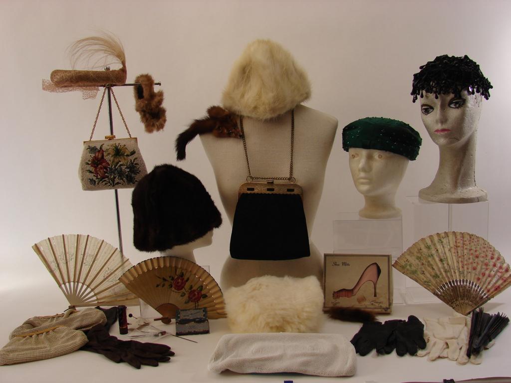 Vintage Hats, Gloves, Old Fans, Furs, Etc: 2 White Mink hats, brown Mink hat, Mink headband with 2 detached earmuffs, mink barrette, 5 antique fans, 3 hats, hat pins, 4 pairs of gloves, 2 white beaded handbags, 2 Whiting and Davis handbags, on