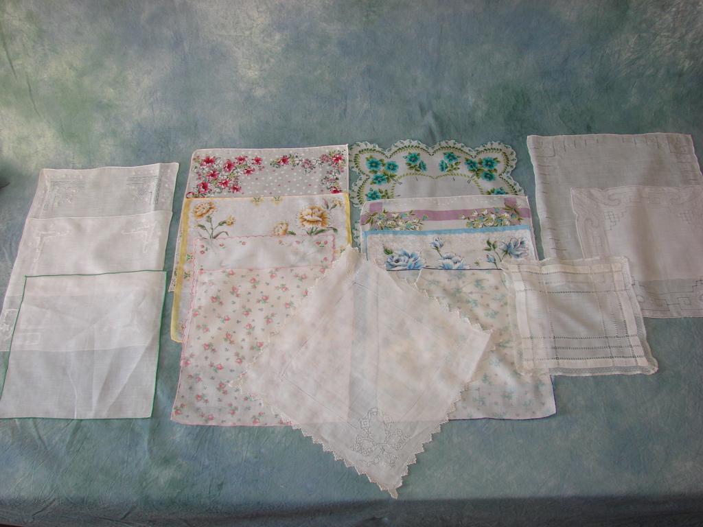 15 Fancy Vintage Handkerchiefs: 7 are printed floral designs, 1 embroidered with pink flowers, 1 white with green finished edge, 6 handmade (one is Madeira, others are needle work, open work, ladder work) largest are 13" square and 