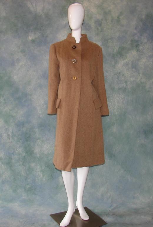 Pauline Treigere Bergdorf Goodman Wool Coat: Camel color coat with 4 gold buttons, 2 pockets, fully lined. 46" L x 42" B x 17" shoulder to shoulder x 44" waist