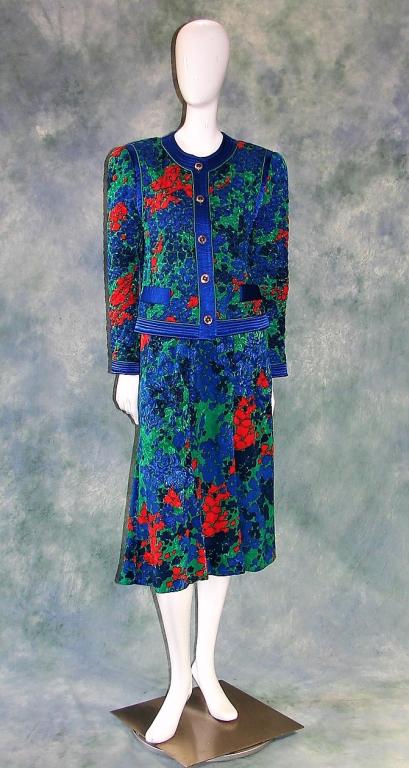 Vintage 1970s Lilli Ann Suit or Dress: 2 piece Suit with a quilted jacket, fully lined, closes with 5 buttons in the front, 2 faux pockets, skirt is elastic on the sides, closes with a zipper and a button, mermaid like hem Skirt: 30" W x 3