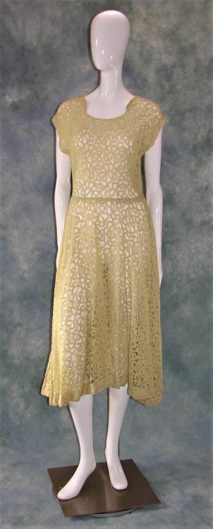 Fit and Flare Charmeuse Lace Ribbon Dress: Very romantic dress in person, all over soft pastel green lace with a pattern that looks like ribbon work, interesting neckline, closes on waist with metal zipper, measures 44" L down the middle X 36"