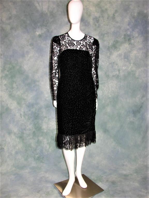 1980s Escada Voided Velvet and Lace Dress: black velvet with voided polka dots all over, rouching all over, lace bodice, long sleeves, keyhole back, closes with a button at the neck and a zipper in back, buttons at wrist, fully lined, lace flo