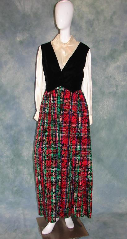 Designer Silk, Velvet and Taffeta Maxi Dress: 1960s, Carrie Couture label, cream candlelight like silk bodice w/long sleeves, pointy collar and darts, prong set rhinestone button at each wrist, black velvet self vest, tartan skirt in taffeta with